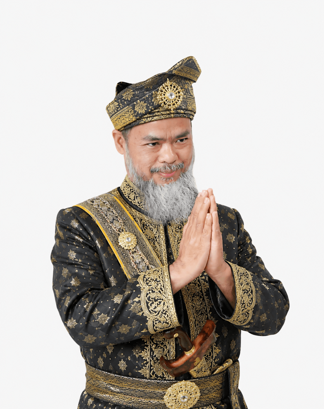 Dr. Hos Arie Sibarani wearing traditional Malay attire